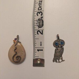 Two necklace pendants